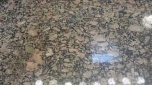 cleaned and polished granite bathroom counter top